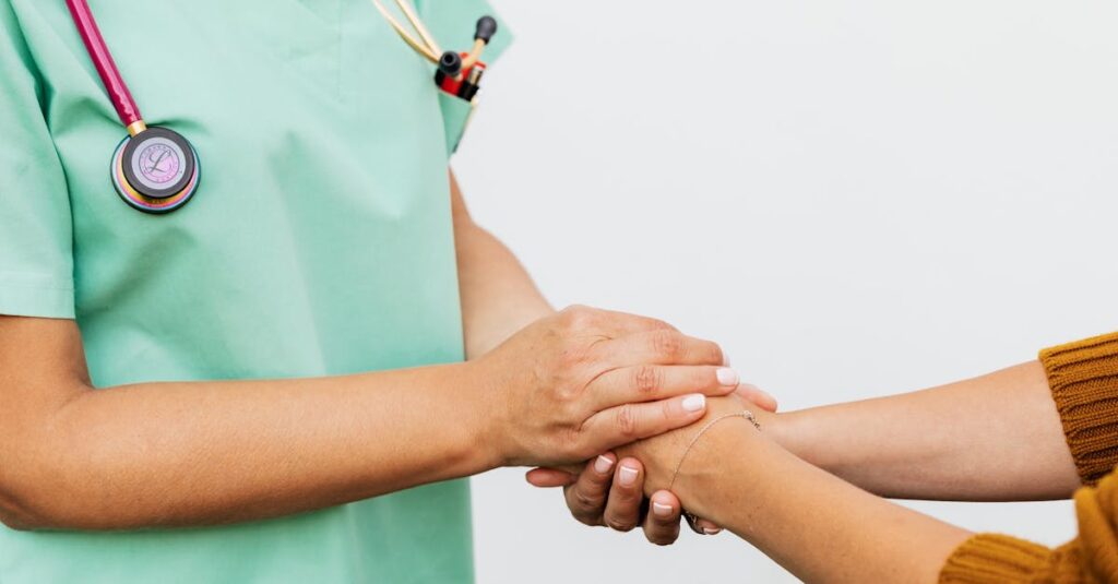 Close-up of a doctor holding a patient's hands, symbolizing trust and empathy in healthcare.